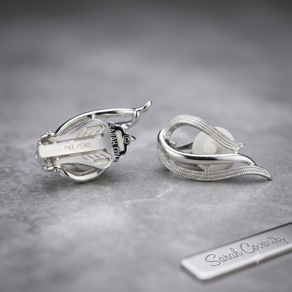 Authentic Signed Sarah Coventry Silver Tone Textured Swirl Clip On Earrings